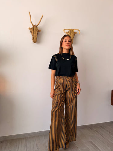 Camiseta tachas hombreras