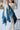 Poncho SIBENY plumas azul