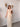 Mono cruzado COMSY beige