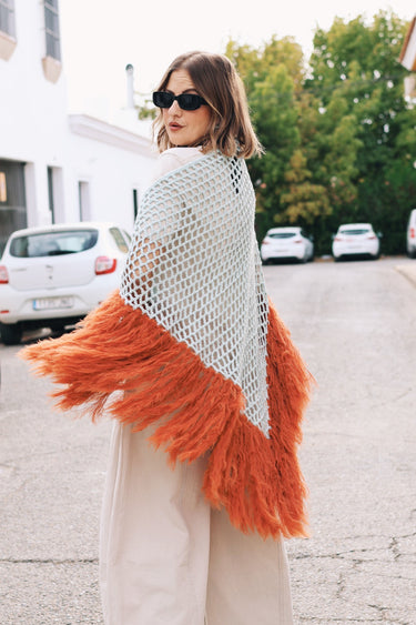Poncho SIBENY plumas naranja