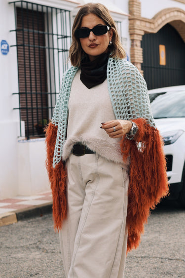 Poncho SIBENY plumas naranja